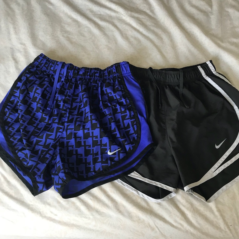 Two pairs of Nike running shorts